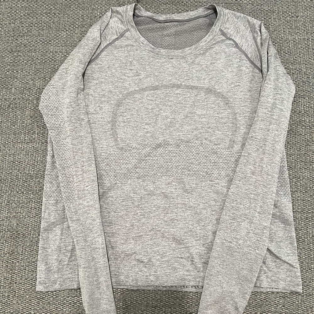 Authentic Lululemon long sleeve sweat wicking  shirt. Good condition.